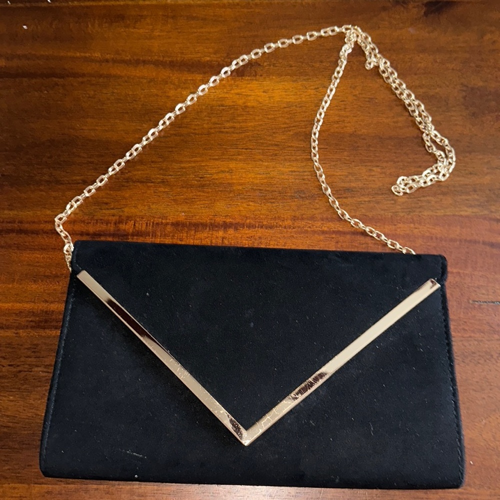 Aldo clutch! In new condition! Black and gold